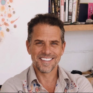 A man in a gray shirt smiling, who is presumably a member of Hunter Biden's LAPTOP memecoin team being referenced in the article text shown alongside the image.

**Note on content:** I should mention that the post text contains potentially misleading or exaggerated information — specifically, a memecoin's market cap reaching "$110 billion" is extraordinarily implausible (that's higher than most major cryptocurrencies), and "$LAPTOP" tokens associated with Hunter Biden have been flagged as likely scam operations. The image doesn't show any identifying context to confirm who the person actually is.