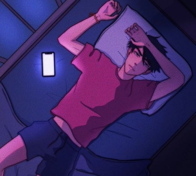 An anime-style young man with dark hair lies on a bed in a dimly lit room, wearing a pink shirt and shorts, with one arm resting over his eyes and the other stretched above his head as if settling in to sleep. A glowing smartphone sits on the bed beside him, its bright screen standing out against the moody blue lighting—capturing a quiet, relatable moment of winding down for the night that matches the "Goodnight people" sentiment.