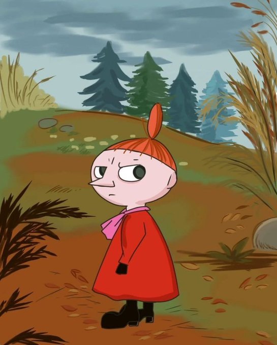 A cartoon character of a little girl with red hair in a bun, wearing a red dress and black boots, standing in a grassy landscape with trees in the background.