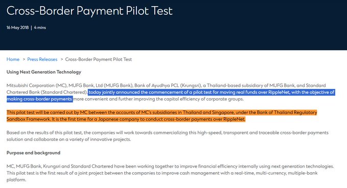 An article titled 'Cross-Border Payment Pilot Test' from May 16, 2018, announcing a joint pilot test by Mitsubishi Corporation (MC), MUFG Bank, Krungsri, and Standard Chartered Bank to conduct cross-border payments over RippleNet.