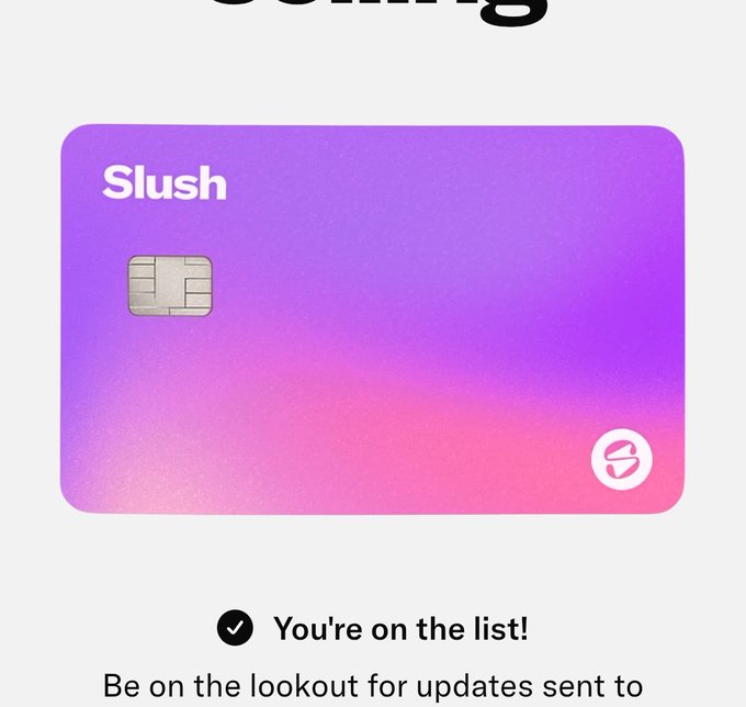 The image shows a purple credit card with a pink background, which appears to be a Slush wallet card. The card has a white stripe running down its center, and it displays an email address for updating the card information. The text on the card reads "You're on the list! Be on the lookout for updates sent to you!".