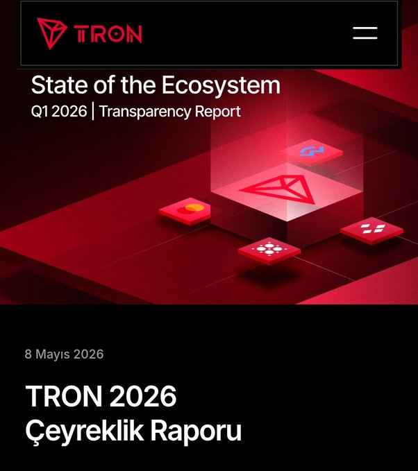 The image features a screen displaying text related to an article titled "TRON 2026 Cayreklik Raporu" which is part of the Q1 report released by the Tron network. The Q1 report highlights that the network has grown from being just a transfer channel into a financial giant in the current year, indicating significant advancements and changes within the Tron ecosystem.