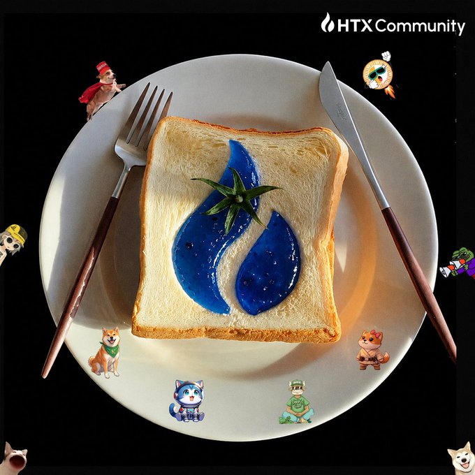 A piece of toast with blue jelly in the shape of a water drop and a green star on top, served on a white plate with a fork and knife, surrounded by various cartoon character stickers and the text 'HTX Community'.