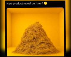 The image features a large pile of hay stacked up against a yellow background. The text "New product reveal on June 1" is written above the hay, suggesting that there might be an upcoming release or promotion related to this hay. The image also includes a Twitter handle and a hashtag, indicating that it could be a social media post about the hay or a related event.