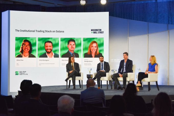 A panel discussion at a 'Washington Wall Street' event titled 'The Institutional Trading Stack on Solana,' featuring speakers Ethan Chan, Chris Heidarik, Mark Niu, and Georgia Quinn from the Solana Policy Institute, seated on stage before an audience.