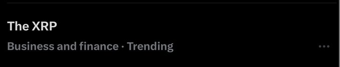 A dark-themed social media post header displays "The XRP" with the category "Business and finance • Trending," confirming that $XRP is currently trending in the business and finance category.