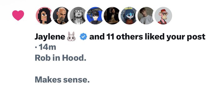 A screenshot showing a notification that "Jaylene and 11 others liked your post" 14 minutes ago, featuring the caption "Rob in Hood. Makes sense." alongside a row of profile pictures. The post appears to reference $CASHCAT, $TENDIES, and $ROBERT tokens, with the simple caption playing on the "Robin Hood" name reference.