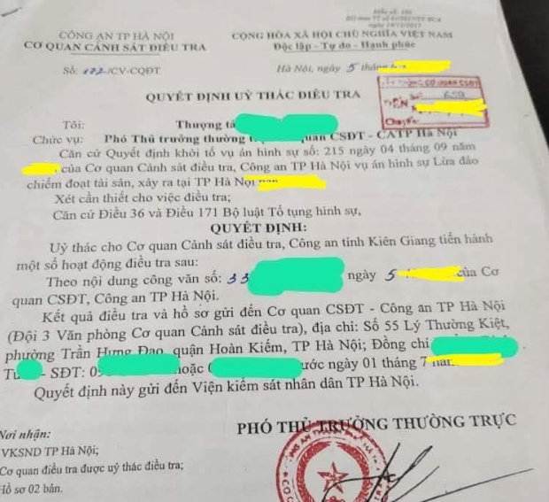 A photographed Vietnamese Hanoi police document (“Quyết định ủy thác điều tra”) references an investigation at 55 Lý Thường Kiệt and Công an TP Hà Nội, with names, dates, and details redacted. It appears to substantiate the accompanying claim that a crowd or “hundreds of people” were involved, though the image itself does not confirm that figure or any Binance/P2P connection.