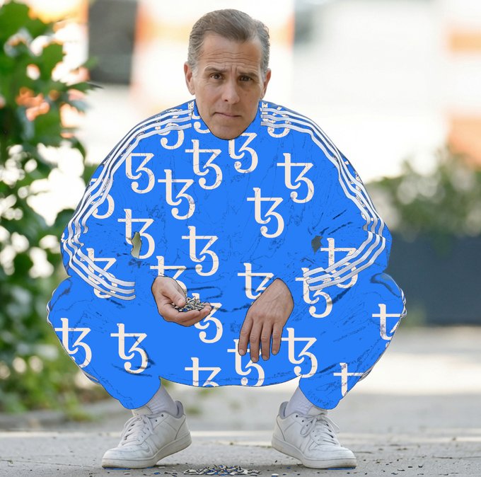 The image features a man wearing a blue suit with white stripes, sitting down and holding a coin between his fingers. He appears to be squatting or crouching over, possibly posing for a photo. The caption "wen hunter4tezos" is written in the corner of the image, which seems to be related to the post about the man on the suit.