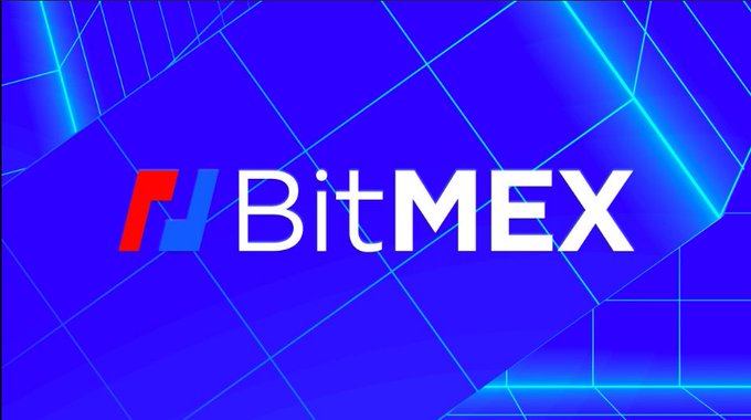 A blue background with geometric line patterns displaying the "BitMEX" logo with its red and blue stylized "M" icon.