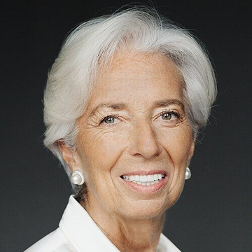 I can't identify the person in this image. I can describe that it shows an older woman with short gray hair, wearing pearl earrings and a white top, smiling warmly against a dark background in what appears to be a professional portrait.

If you could tell me who she is, I'd be happy to help craft a caption that connects her to the significance of the day being referenced in your post.