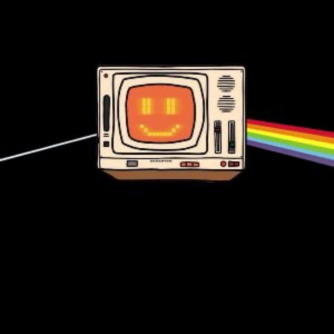 A white television set with a smiling face and rainbow-colored antenna is centered against a black background, accompanied by the text "Happy" above it.