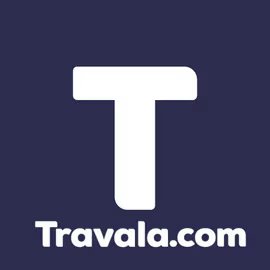 The image shows the Travala.com logo, featuring a large white "T" on a dark navy blue background with the website URL displayed below. This logo accompanies news of a confirmed data breach at Travala, with the post noting that despite exposure of user names, emails, and phone numbers, the $AVA token has risen over 30% for the month.