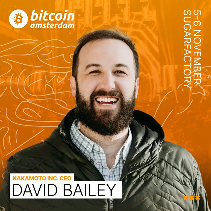 The image is a promotional graphic for Bitcoin Amsterdam 2026, featuring a smiling bearded man in a green puffer jacket against an orange Bitcoin-themed background. Text on the image identifies him as "David Bailey, Nakamoto Inc. CEO," with event details "5-6 November, SugarFactory" and the Bitcoin Amsterdam logo displayed at the top, visually introducing him as a featured speaker at the November 5–6, 2026 conference.