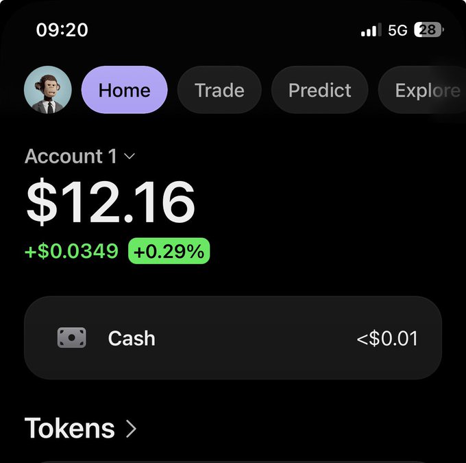 A mobile app screenshot showing a trading account with a balance of $12.16, showing a gain of +$0.0349 (+0.29%), with navigation tabs for Home, Trade, Predict, and Explore.