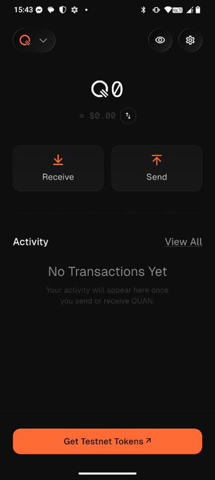 A mobile wallet interface for QUAN cryptocurrency shows a balance of $0.00, with options to 'Receive' or 'Send', noting 'No Transactions Yet' and offering a 'Get Testnet Tokens' button.