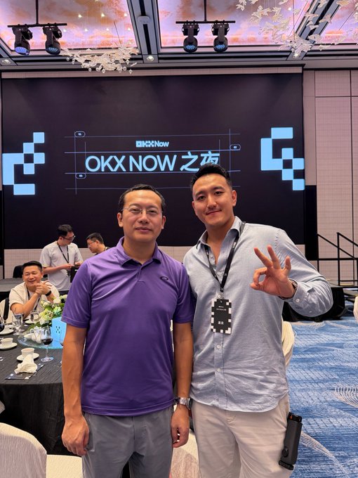 Two men smile and pose at an OKX NOW 之夜 (OKX NOW Night) event, with one making an "OK" hand gesture, reflecting the post's gratitude to "big brother Star" (@star_okx) for his hospitality at the crypto industry gathering celebrating OKX's growth from exchange to wallet to X Layer.