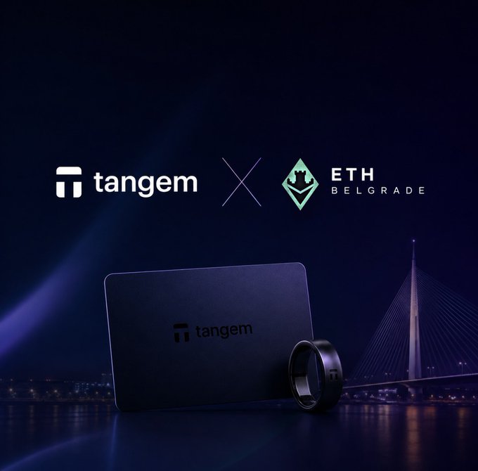 A promotional graphic showing the 'tangem' logo next to 'ETH BELGRADE', featuring a Tangem hardware wallet card and ring displayed against a nighttime cityscape with a bridge.