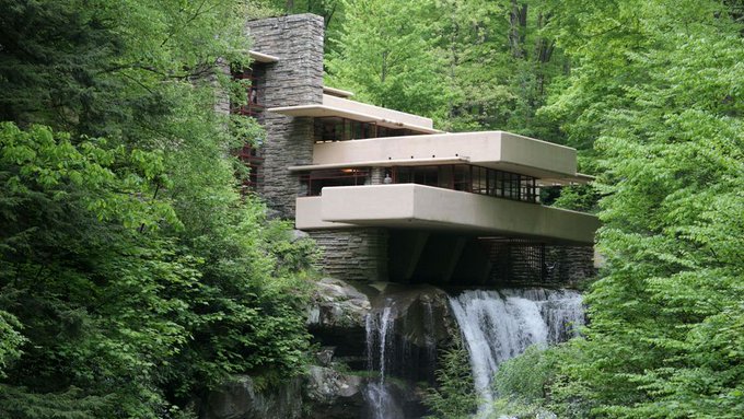 Fallingwater, the iconic Frank Lloyd Wright house perched above a waterfall in the woods, evokes the harmony between architecture and nature—a fitting visual metaphor for building trading strategies on Base App.