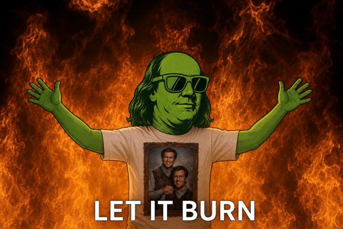 A meme featuring a green-skinned character with sunglasses and long hair, arms raised, wearing a t-shirt with a framed photo, set against a fiery orange background with the text 'LET IT BURN'.