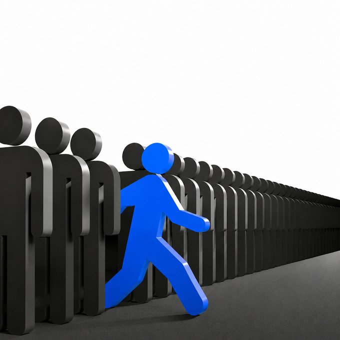 A blue figure breaks away from a uniform line of dark figures, standing out as a leader rather than a follower. The imagery visually reinforces the message about forging an independent path with InterLink (ITL/ITLG/ITLX).