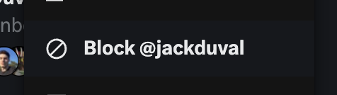 A dark-themed social media interface displays a 'Block @jackduval' button next to a user profile with a partial visible name.