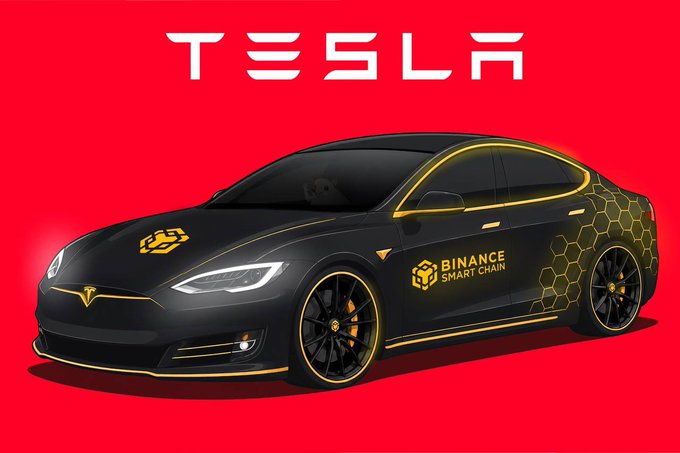 A black Tesla car with gold trim featuring 'Binance Smart Chain' branding on a red Tesla logo background.