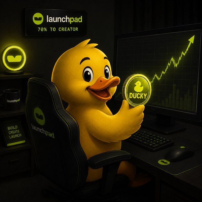 A cartoon yellow duck mascot sits in a gaming chair holding a coin labeled 'DUCKY', with a 'launchpad' sign reading '70% TO CREATOR' and a rising green chart on the monitor behind it.