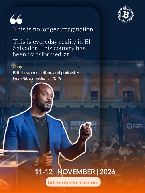 Promotional image for Bitcoin Histórico 2026 (November 11-12, 2026, bitcoinhistorico.com) featuring Zuby, identified as a British rapper, author, and podcaster, quoting from the 2025 event: "This is no longer imagination. This is everyday reality in El Salvador. This country has been transformed." The image shows him speaking on stage against a blue-lit backdrop with the event's Bitcoin-themed branding.