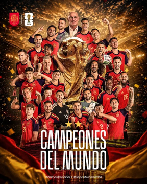 A celebratory graphic featuring the Spanish national soccer team posing around the World Cup trophy with the text 'CAMPEONES DEL MUNDO' (World Champions) displayed prominently.