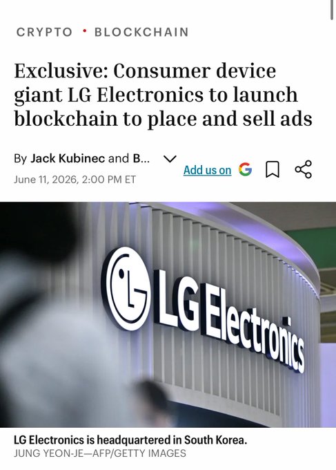 The image shows a close-up of an LG Electronics store front, featuring a large white sign displaying the company's name. The text in the image reads "Another One: LG is the latest publicly listed enterprise to launch their blockchain with @arbitrum." This suggests that LG has recently launched its own blockchain platform and is promoting it as part of their marketing efforts.