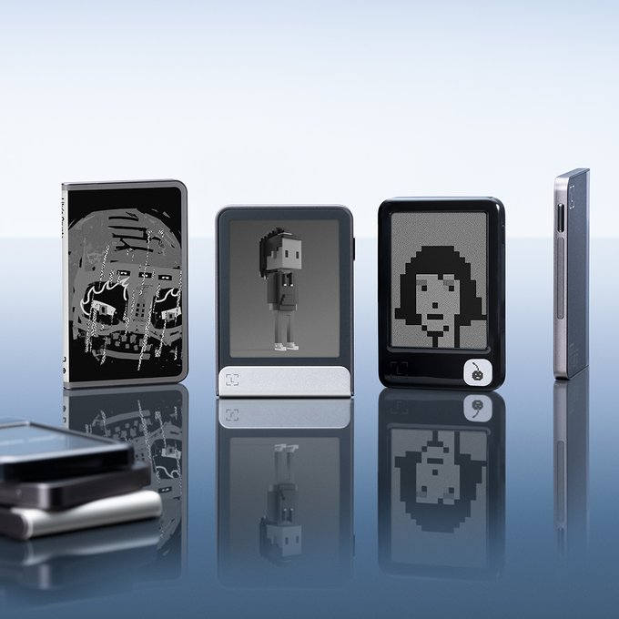 Four Ledger hardware wallets stand on a reflective surface, their e-ink displays showing pixel-art images including a skull, a figure, and a hooded character, alongside a stack of additional devices. The image visually reinforces the message of self-custody by showcasing secure, offline signer devices that allow users to maintain access to their assets regardless of exchange policy changes.