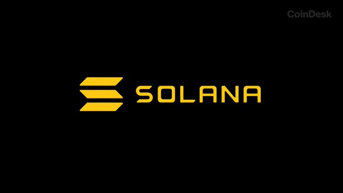 Solana cryptocurrency logo (gold stylized 'S') displayed on a black background with the CoinDesk watermark in the corner.