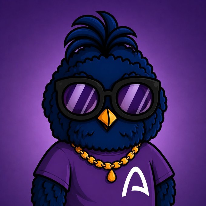 A cartoon illustration of a dark blue bird character wearing large black sunglasses, a gold chain necklace with a pendant, and a purple t-shirt featuring a white 'A' logo against a purple background.