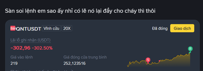 A cryptocurrency trading screen showing a position on QNT/USDT with a significant unrealized loss of -302.96 (-302.50%), entry price of 219, and average closing price of 252.123516, with Vietnamese text asking why someone would long after the price dropped.