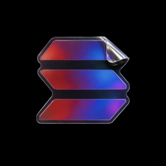 A 3D-styled logo featuring three horizontal, arrow-shaped bars with a red-to-blue gradient on a black background, with the top-right corner appearing to peel back like a sticker.