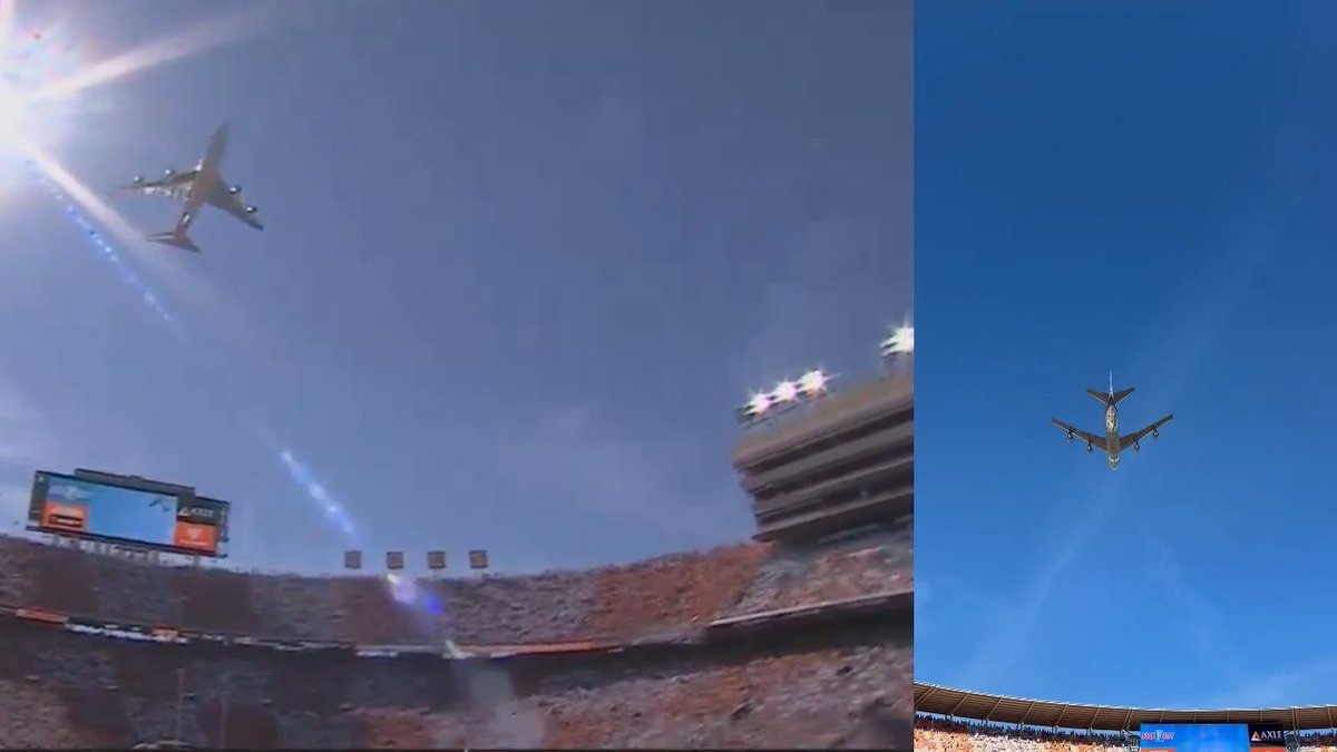 A large military aircraft flies low over a packed football stadium, with a side view showing it soaring above the stands and a clear blue sky, likely capturing a flyover event. The scene conveys the grandeur and spectacle of a flyover, complementing the post's message about RSA's leadership with imagery of dominance and awe-inspiring presence.
