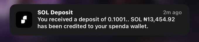 A smartphone notification from SOL Deposit showing a 2-minute-old alert: 'You received a deposit of 0.1001... SOL ₿13,454.92 has been credited to your spenda wallet.'