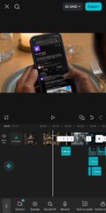 The image shows a heavily blurred, horizontally stretched view of a smartphone displaying what appears to be the PayBox app, with notification icons visible along the top of a dark interface. The accompanying post confirms this is the user excitedly sharing behind-the-scenes planning content for a PayBox USDC launch promo, likely a teaser trailer-style video they've been preparing since the product's launch day.
