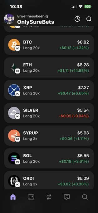 The image displays a smartphone screen showing an app with a long list of cryptocurrency symbols including Bitcoin, Etherum, Ripple, and others such as Btc, XRP, etc., along with their respective values like $12.22, -8.72, $56.29, and $0.59/1 BTC. The post on the left side indicates that this app is for only surebet.com, a cryptocurrency trading platform known for its active community. Users can buy or sell various cryptocurrencies using this app to trade in real-time.