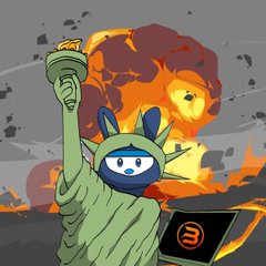A cartoon illustration shows the Statue of Liberty with a blue bunny-like face holding a torch, with a large explosion in the background and a laptop displaying a red logo in the foreground.