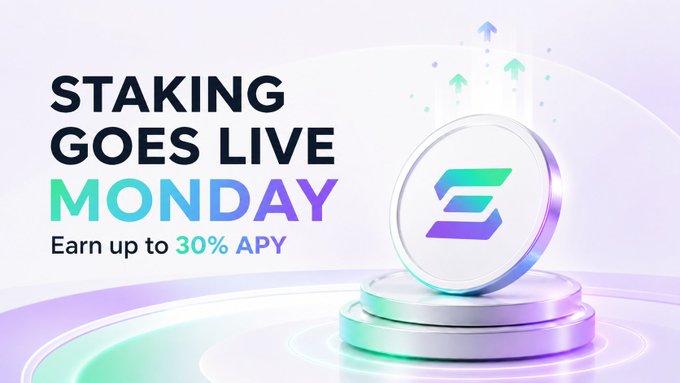 A promotional graphic announcing 'STAKING GOES LIVE MONDAY' with potential earnings of up to 30% APY, featuring a 3D metallic coin with a stylized 'E' or 'C' logo on a glowing pedestal.