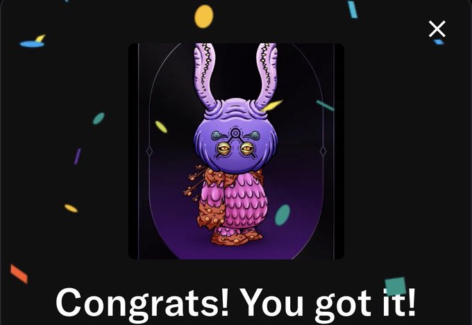 Digital celebratory screen reading 'Congrats! You got it!' showing a purple fantasy creature with horns and a pink textured outfit against a confetti background.