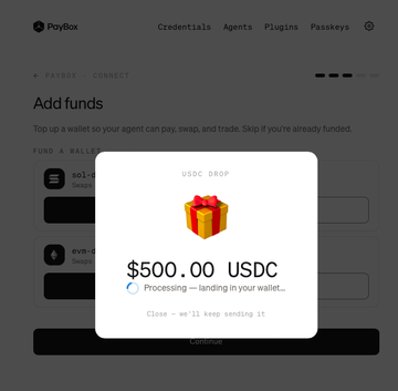 A screenshot of the PayBox app showing a 'USDC DROP' confirmation of $500.00 USDC with the message 'Processing - landing in your wallet...'.
