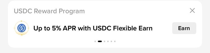A promotional banner for a 'USDC Reward Program' offering 'Up to 5% APR with USDC Flexible Earn' alongside an Earn button.