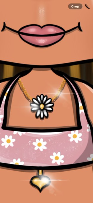 A close-up screenshot from a dress-up/doll game showing a character's lower face, neck, and torso wearing a pink floral top with a daisy pendant necklace and gold heart belly-button ring, with a "Crop" button visible.