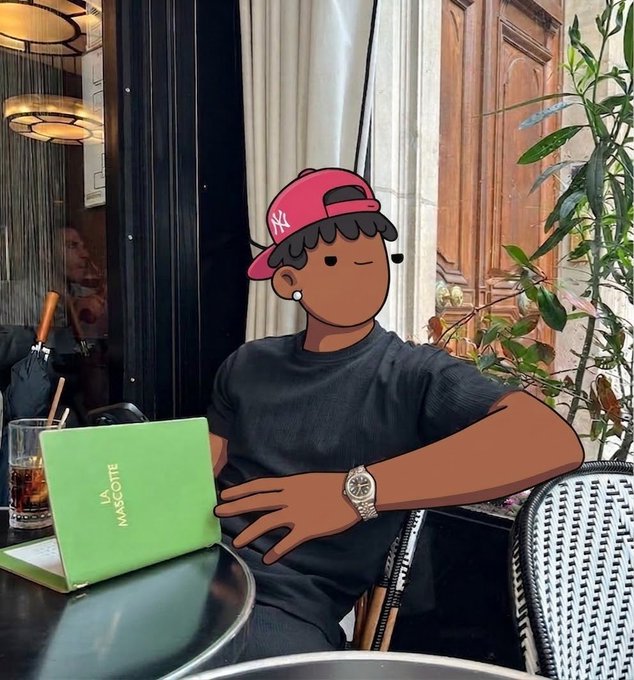 A cartoon-style avatar of a person wearing a pink NY Yankees cap and a black shirt sits at a cafe with a green La Vie Mascotte menu and a glass of iced drink.
