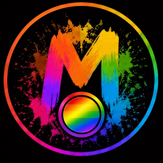 A vibrant logo featuring a rainbow-colored letter 'M' with paint splatter effects above a circular multicolored emblem, all enclosed within a rainbow gradient ring on a black background.