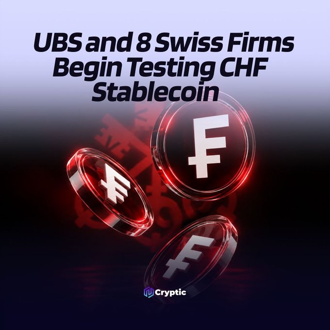 A graphic titled "UBS and 8 Swiss Firms Begin Testing CHF Stablecoin" features glowing red digital coins displaying the Swiss franc symbol (₣), visually representing the CHFD stablecoin initiative referenced in the post, where UBS and other Swiss companies are piloting a 1:1 franc-pegged token for tokenized asset settlement and programmable payments.