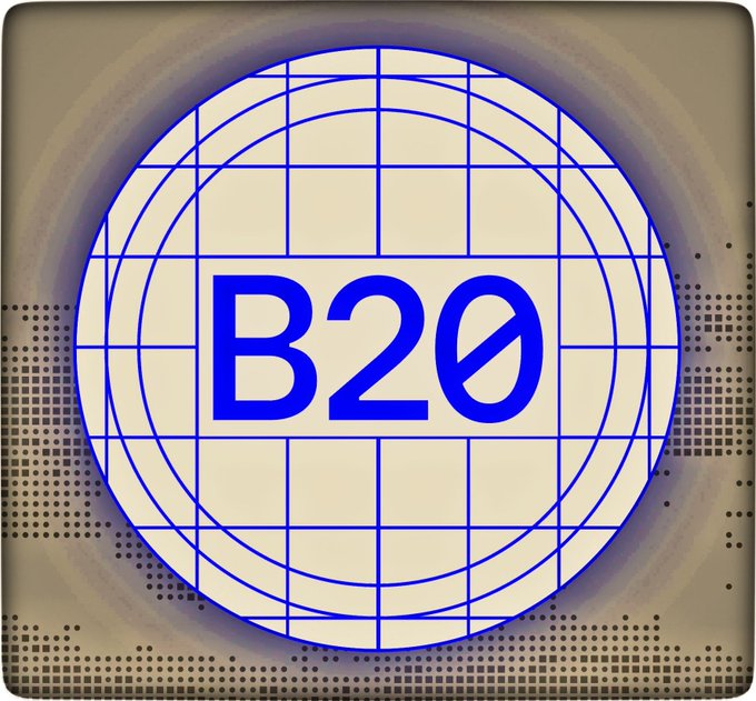 A circular blue logo featuring a globe grid with the text 'B2Ø' in the center, set against a brown pixelated background.